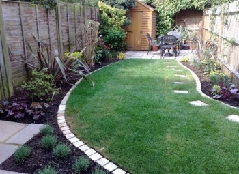 Edged-Lawn-and-Flower-Beds-with-Small-Patio